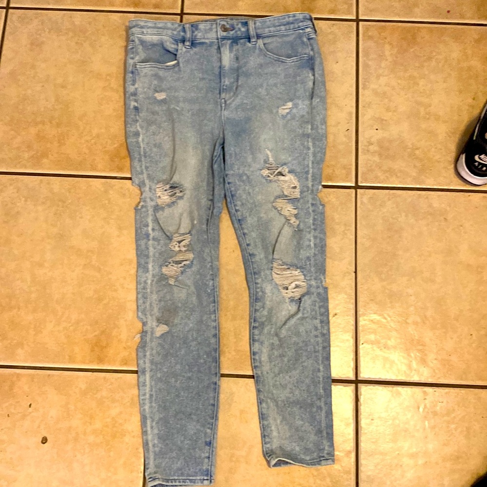 American Eagle faded ripped blue jeans